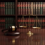 Professional legal concept featuring a gold balance scale and wooden gavel on a desk, representing commercial litigation and settlement cost-shifting strategies such as Calderbank Offer.